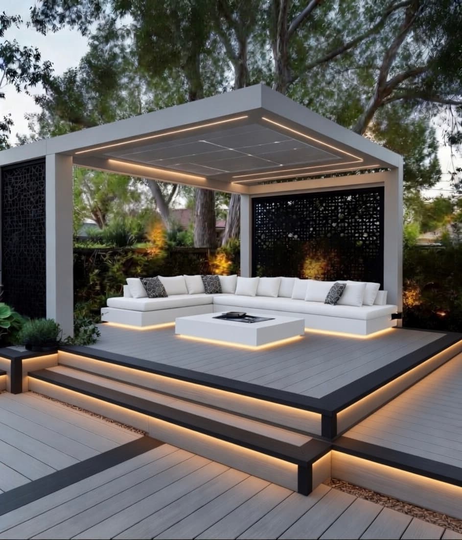 Modern white pavilion with integrated LED accent lighting by Vivid Outdoor Living